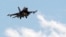 FILE - A Turkish F-16 fighter jet approaches Incirlik Air Base in Adana, Turkey, July 3, 2012. 