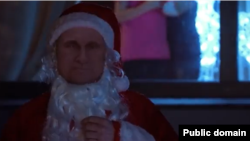 A screenshot from a Russian propaganda ad featuring Russia's President Vladimir Putin as Santa. (Telegram)