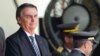 Presiden Brazil Jair Bolsonaro menghadiri upacara wisuda kadet Akademi Militer di Resende, negara bagian Rio de Janeiro, Brazil, Sabtu, 26 November 2022. (Foto: TÉRCIO TEIXEIRA / AFP)
