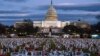 Gedung Capitol di National Mall, Washington, D.C., Sabtu, 17 Desember 2022, menjadi latar belakang acara penghormatan warga Iran yang diduga dibunuh oleh pemerintah mereka dalam aksi solidaritas untuk mendukung protes yang sedang berlangsung di Iran. (AP Photo/Nathan Howard)