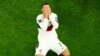 Cristiano Ronaldo bereaksi setelah Portugal kalah melawan Maroko pada babak perempat final Piala Dunia 2022 di Thumama Stadium, Doha, Qatar. (REUTERS/Fabrizio Bensch)