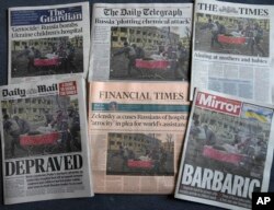Front pages of British newspapers published March 10, 2022, show reactions to an airstrike on a maternity hospital in Mariupol, Ukraine, a day earlier.