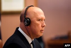 Menteri Pertahanan Australia Peter Dutton di Gedung Parlemen Australia di Canberra, 13 Desember 2021. (LUKAS COCH / POOL / AFP)