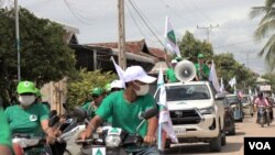 គណបក្ស​ប្រជាធិបតេយ្យ​មូលដ្ឋាន​ ចាប់​ផ្តើម​ហែក្បួន​ឃោសនា​ការបោះ​ឆ្នោត​ថ្ងៃ​ដំបូង​នៅ​សង្កាត់កោះ​ដាច់​ ខណ្ឌ​ជ្រោយ​ចង្វារ​ នៅ​​រាជធានី​ភ្នំពេញ​ ថ្ងៃទី​២១ ខែឧសភា​ ឆ្នាំ២០២២។ (លាស់ លីបលីប/វីអូអេ)