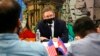 FILE - Counselor of the US Department of State Derek Chollet speaks during a round table briefing with journalists in Phnom Penh, Cambodia, Dec. 10, 2021.