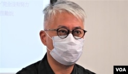 时事评论员黄伟国表示，李家超得票率超过99%与全票分别不大， 他不认为北京故意安排12名选委投不支持及白票，结果反映北京施压下，建制派团结只是假像。 (美国之音/汤惠芸)