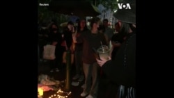 悉尼的华人和留学生烛光悼念乌鲁木齐火灾死难者 