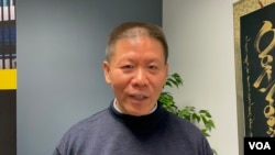 资料照片：对华援助协会创办人傅希秋牧师在华盛顿近郊接受美国之音采访。（2022年11月30日）