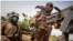 Soldiers of the Malian army during a patrol on a road between Mopti and Djenne, central Mali, Feb. 28, 2020. (AFP)