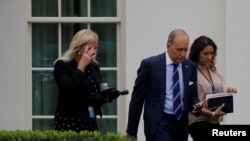 白宫首席经济顾问库德洛2019年8月2日走出白宫西翼办公室。