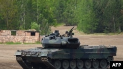 资料照：德国制造的豹式 2 A7 主战坦克。