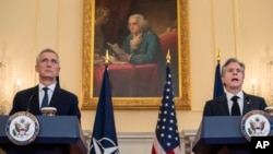 U.S. Secretary of State Antony Blinken, right, and NATO Secretary-General Jens Stoltenberg speak at a press conference after meeting at the State Department in Washington, Feb. 8, 2023.