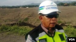 Menko Perekonomian Darmin Nasution yakin NYIA akan selesai lebih cepat dari target. (Foto: VOA/Nurhadi)
