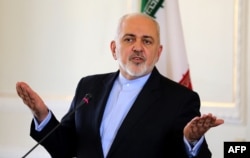 FILE - Iran's Foreign Minister Mohammad Javad Zarif gestures during a press conference in Tehran, Feb. 13, 2019.
