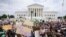 Protesters gather outside the U.S. Supreme Court in Washington on Friday, June 24, 2022, the day a ruling rescinded abortion rights. (Jacquelyn Martin/AP)