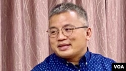 香港记者协会主席 陈朗升 估计，区家麟被捕可能与立场新闻案有关，质疑当局的红线难以触摸。 (美国之音汤惠芸)