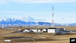 A U.S. Air Force installation surrounded by farmland is pictured on Feb. 7, 2023, near Harlowton, Mont. Lawmakers across the nation are weighing further restrictions on foreign ownership of U.S. farmland. (Matthew Brown/AP)
