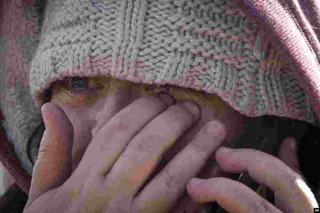 Masha Fesenko, from Kyiv, arrives at the border crossing in Medyka, Poland, March 8, 2022.&nbsp;Russia&#39;s invasion of Ukraine has set off the largest mass migration in Europe in decades, with more than 1.5 million people having crossed from Ukraine into neighboring countries.