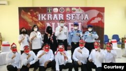 Delapan terpidana terorisme di Sumatra Utara yang bersumpah setia kepada Republik Indonesia. Rabu, 9 Maret 2022. (Sumber: Humas Kemenkumham Sumatra Utara)