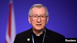FILE - Vatican Secretary of State Cardinal Pietro Parolin in Glasgow, Scotland, Britain, Nov. 2, 2021.