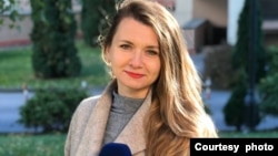 FILE - Olha Mykhaliuk of Ukraine 24 channel while reporting on food prices in the country shortly before Russia invaded Ukraine. (Photo courtesy: Olha Mykhaliuk)