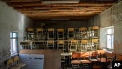 FILE - A classroom that previously was used for girls sits empty in Kabul, Afghanistan, Dec. 22, 2022.