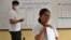 Cambodian election officials count ballots at a polling station during local commune elections in Phnom Penh, June 5, 2022. 