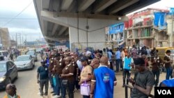 Hotunan Kungiyar Kwadago Lokacin Da suke Gudanar Da Zanga-Zanga