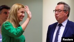 European Commissioner of Energy Kadri Simson and Finland's Minister of Economic Affairs Mika Lintila take part in an extraordinary meeting of European Union energy ministers in Brussels, July 26, 2022. 