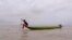 A boy rides a boat across the Tonle Sap lake, in Kampong Loung of Pursat province, Cambodia, on May 04, 2022. (Khan Sokummono/VOA Khmer)