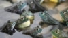 FILE - American bullfrogs are seen at the Jurong Frog Farm in Singapore, Dec. 11, 2008. 