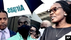 在佐治亚州布朗斯维克,阿莫德·阿贝里的母亲旺达·库珀-琼斯和父亲马尔库斯·阿贝里在特拉维斯·麦克迈克尔被判刑后对媒体讲话。(2022年8月8日)