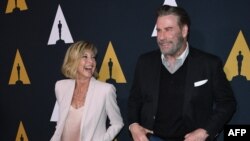 ARHIVA - Olivija Njutn-Džon i Džon Travolta dolaze na proslavu 40. godišnjice filma "Brilijantin" u Holivudu, 15. avgusta 2018.