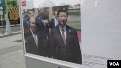 习近平7月访俄期间,官方塔斯社在莫斯科街头曾举办图片展览介绍俄中关系。