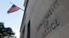 FILE - Signage is seen at the U.S. Department of Justice headquarters in Washington, Aug. 29, 2020. 