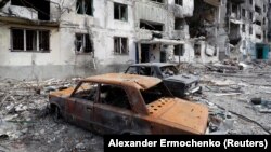 Posledice rata u Marijupolju (Foto: REUTERS/Alexander Ermochenko)