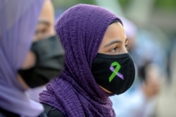 Masyarakat melakukan protes Islamofobia, di Toronto, Ontario, Kanada 18 Juni, 2021. (Foto: REUTERS/Alex Filipe)