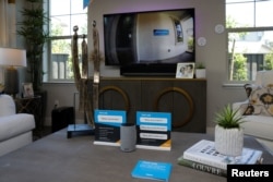 An Amazon Echo displays a video feed of the front door on a TV in the living room of an Amazon "experience center" in Vallejo, California, May 8, 2018.