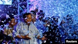 FILE - Presidential candidate Prabowo Subianto claims victory after unofficial vote counts during an event to watch the results of the general election in Jakarta, Indonesia, Feb. 14, 2024.