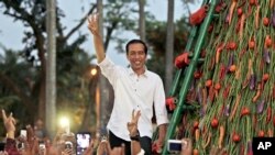 Presiden terpilih Joko Widodo dalam sebuah acara kampanye. (AP/Dita Alangkara)