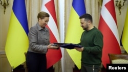 Данська прем'єрка Метте Фредеріксен і президент України Володимир Зеленський, Львів, 23 лютого 2024. Офісі президента України/REUTERS