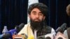 Juru bicara Taliban Zabihullah Mujahid saat berpidato pada konferensi pers pertama di Kabul pada 17 Agustus 2021 setelah pengambilalihan Afghanistan oleh Taliban. (Foto: AFP)
