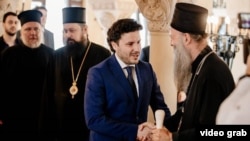 Predsjednik Vlade Crne Gore Dritan Abazović i srpski patrijarh Porfirije tokom sastanka u Beogradu, 30. juna 2022. (Foto: Radio-televizija Crne Gore, videogreb)