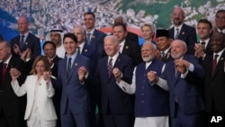 World leaders attending the G20 Summit pose for a group photo in Rio de Janeiro, Nov. 19, 2024. 