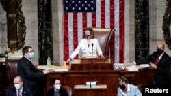 រូប​ឯកសារ៖ កិច្ច​ប្រជុំ​​រដ្ឋសភា​មួយ​ដឹកនាំ​ដោយ​អ្នកស្រី Nancy Pelosi ប្រធាន​រដ្ឋសភា​​សហរដ្ឋ​អាមេរិក​ កាល​ពី​​ថ្ងៃ​ទី​១០ ខែ​មីនា ឆ្នាំ​២០២១។