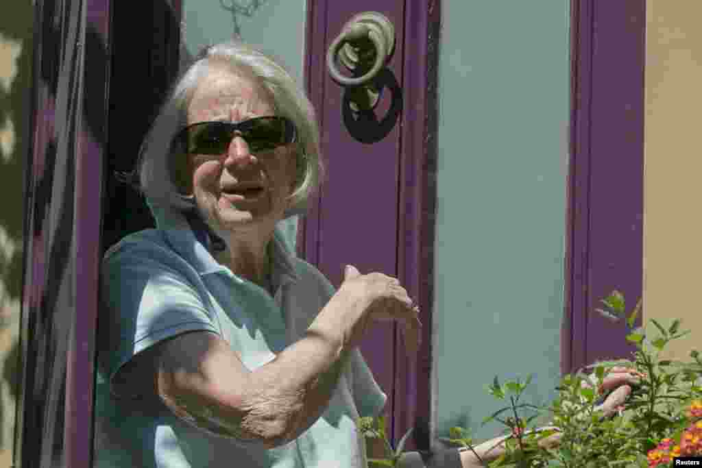 Nancy Curtis, mother of American journalist Peter Theo Curtis, briefly answers reporters' questions outside her home in Cambridge, Massachusetts, Aug. 25, 2014.