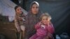 In Gaza's crowded tent camps, women wrestle with a life stripped of privacy
