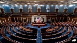 FILE - The chamber of the House of Representatives is seen at the Capitol in Washington, Feb. 28, 2022. In the 2024 elections, Republicans have won enough seats to control the U.S. House, completing the party's sweep into power.