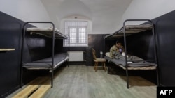 A photograph obtained on Jan. 11, 2025, from the Telegram account of V_Zelenskiy_official shows an alleged North Korean soldier detained by Ukrainian authorities at an undisclosed location in Ukraine, following his capture in Russia's Kursk region by Ukrainian troops.