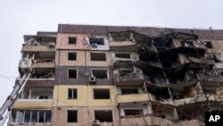 Наслідки атаки Росії по житловому будинку у Кривому Розі, 13 березня 2024. AP Photo/Alex Babenko